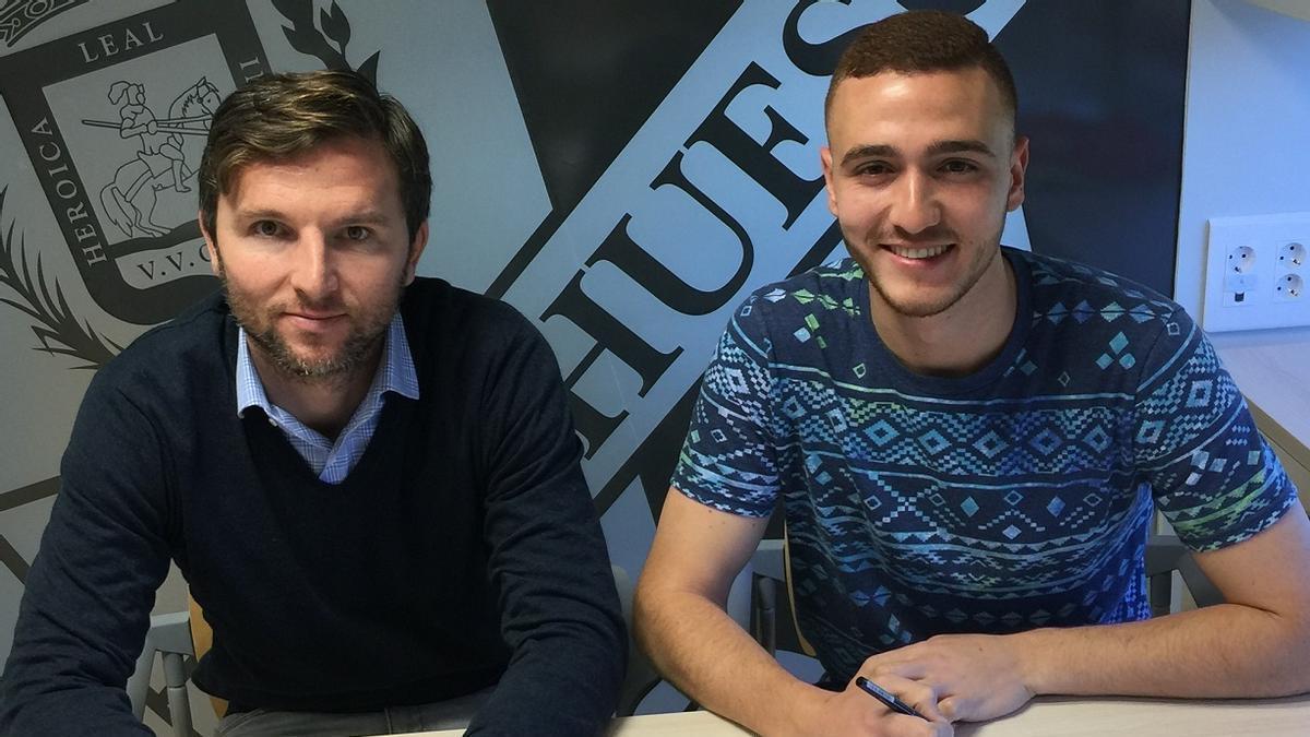 Lalo Arantegui posa con Agus Alonso durante su etapa en el filial del Huesca