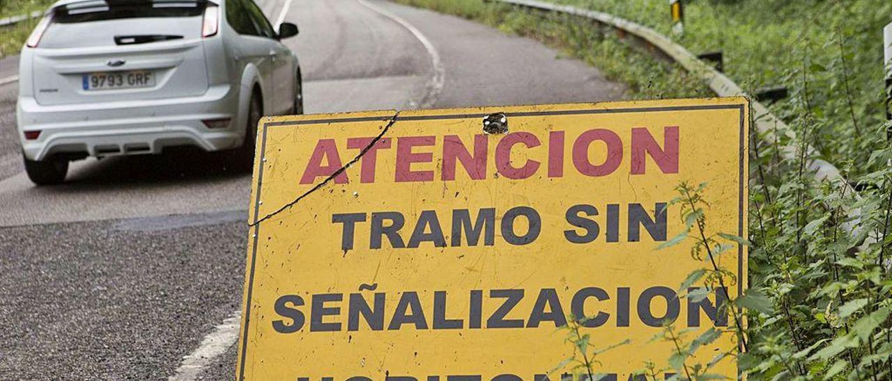Arrancan las obras en la vieja carretera a Oviedo para el final de etapa  del Angliru - La Nueva España