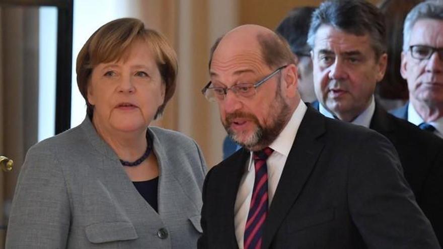 Merkel y Schulz acuerdan reeditar la gran coalición