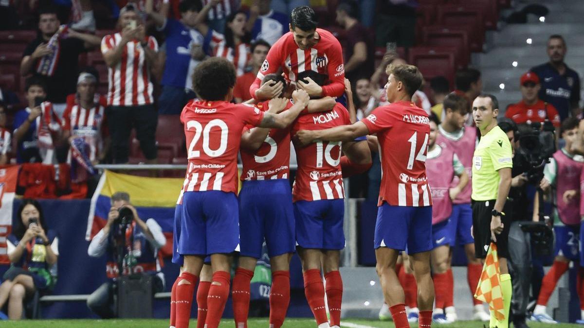 Jugadores del Atlético celebran un gol en Champions