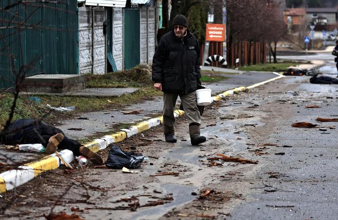 Bodies of civilians lie in the street, amid Russias invasion on Ukraine, in Bucha
