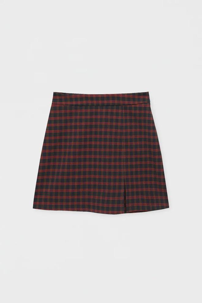 Mini falda cuadros con abertura de Pull&amp;Bear (precio: 17,99 euro)