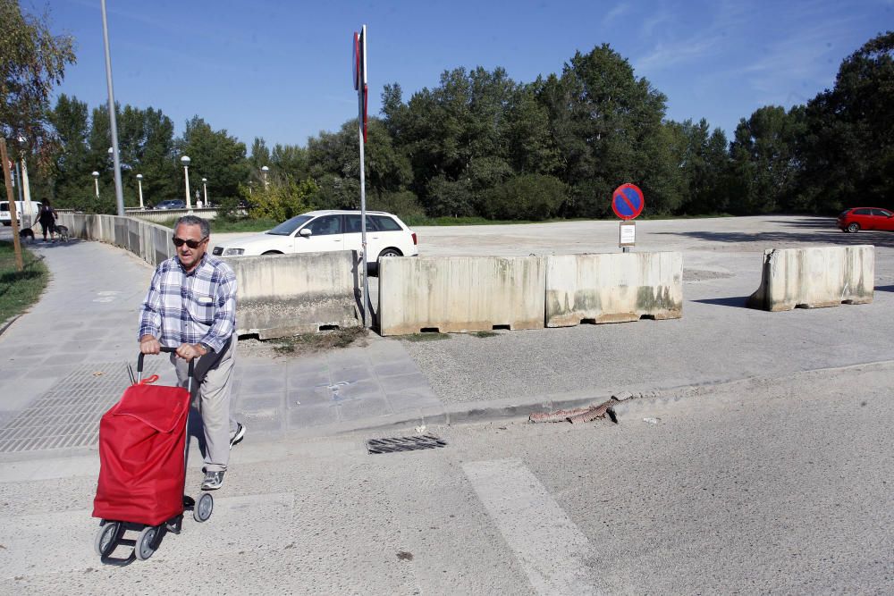 Tanquen el solar situat entre l'Auditori i el pont de Fontajau