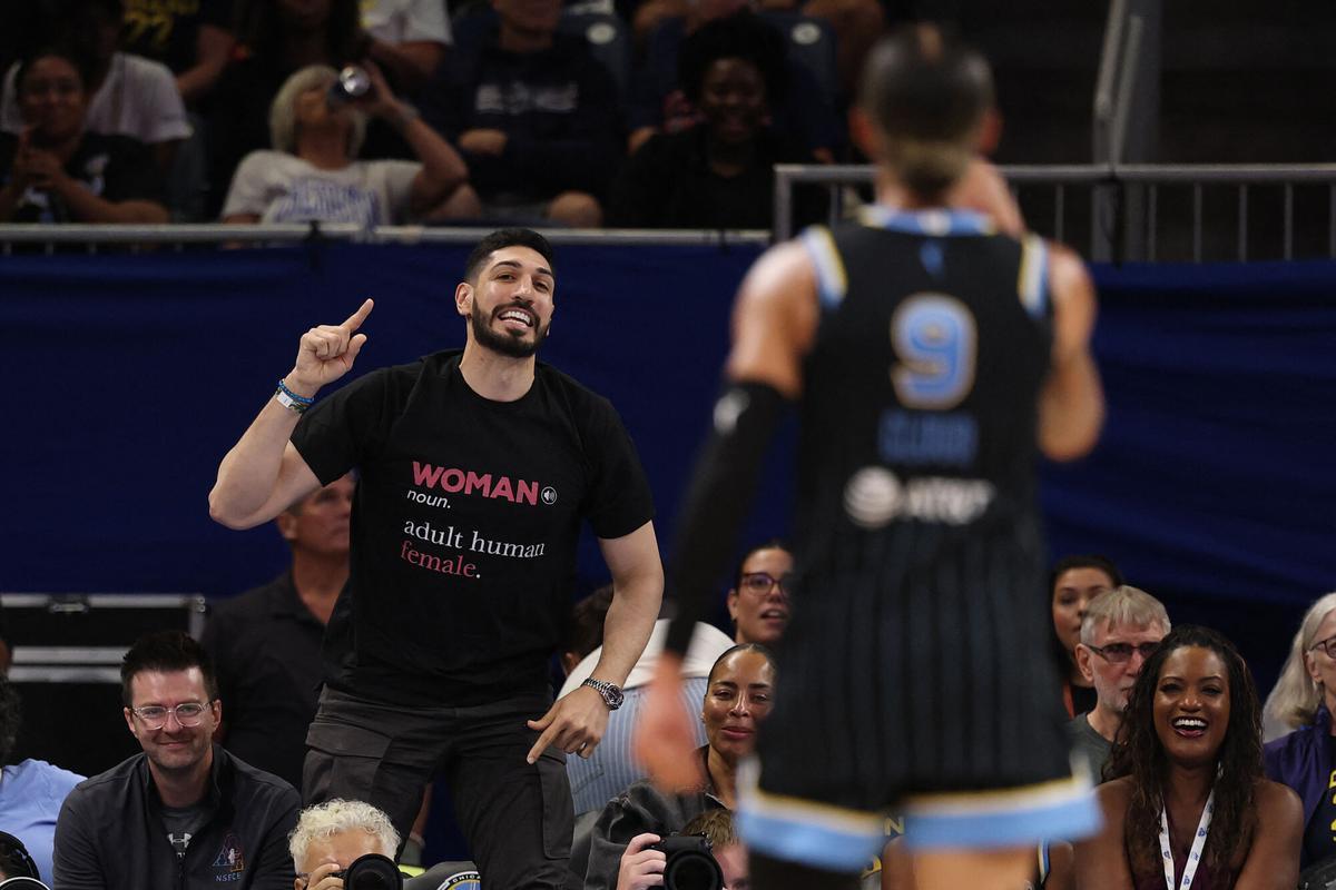 CHICAGO, ILLINOIS - AUGUST 23: Former basketball player Enes Kanter Freedom and Natasha Cloud #9 of the Chicago Sky yell at one another during the second half between the Chicago Sky and the Indiana Fever at Wintrust Arena on August 23, 2026 in Chicago, Illinois. NOTE TO USER: User expressly acknowledges and agrees that, by downloading and or using this photograph, User is consenting to the terms and conditions of the Getty Images License Agreement.   Michael Reaves/Getty Images/AFP (Photo by Michael Reaves / GETTY IMAGES NORTH AMERICA / Getty Images via AFP)