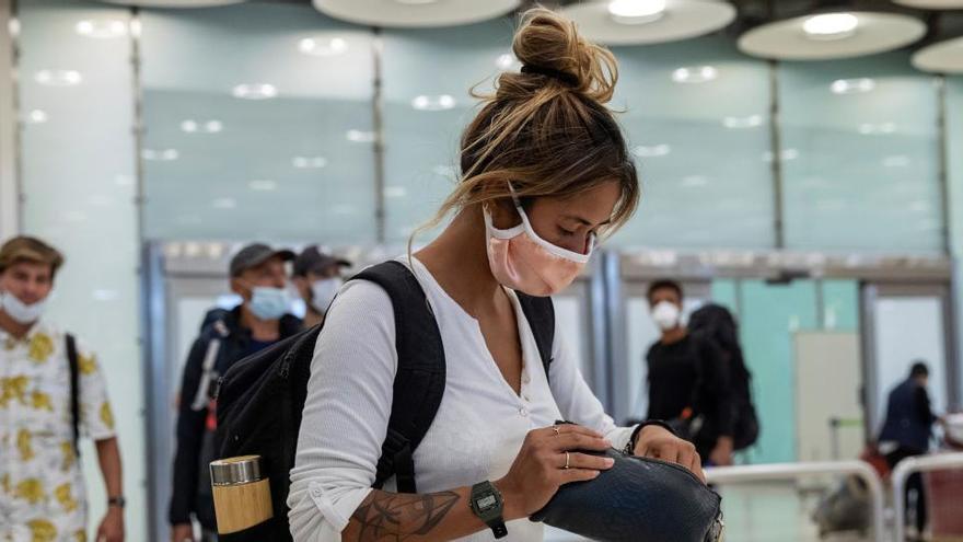 Pasajeros en el aeropuerto de Barajas.