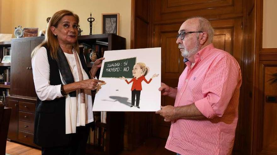 Carmela Silva junto al caricaturista Gogue. // Gustavo Santos