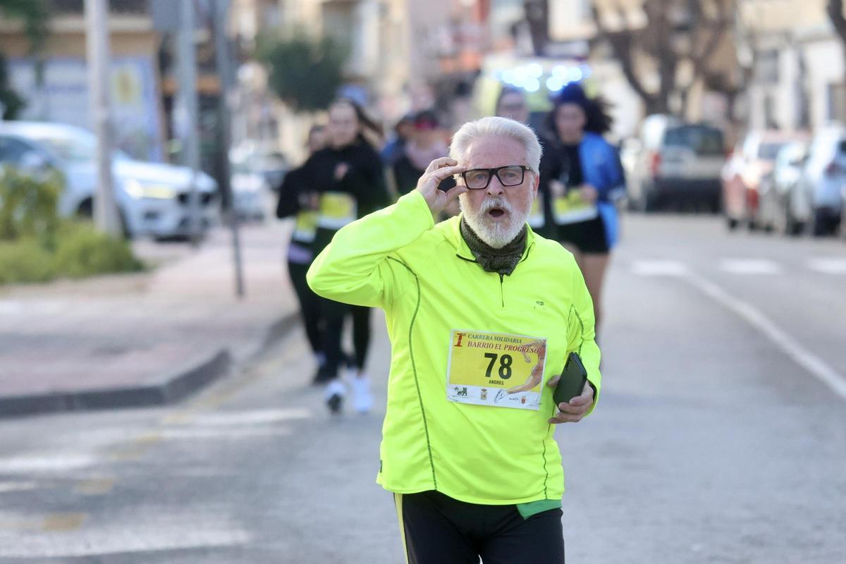 Las imágenes de la carrera popular solidaria en el barrio de El Progreso