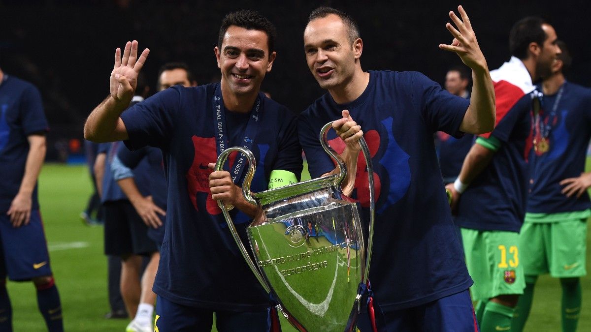 Xavi e Iniesta, celebrando una Champions