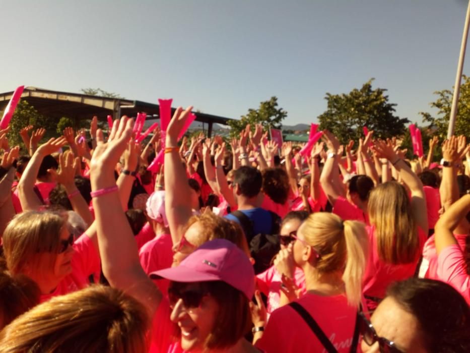 Miles de mujeres en la carrera de la mujer en Gijó