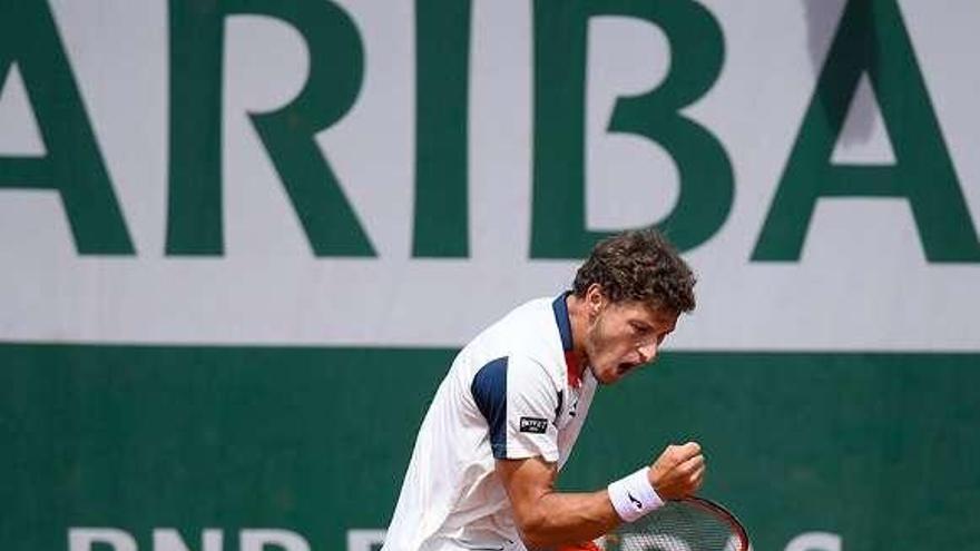 Carreño celebra uno de los puntos del partido ante Bedene.