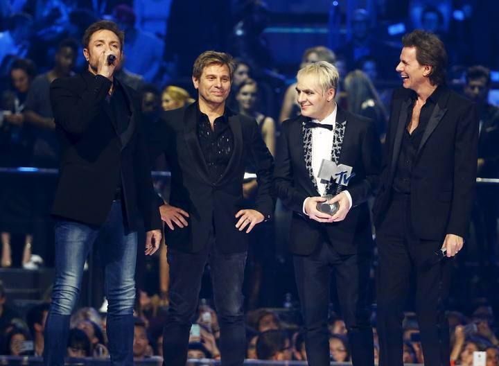 British band Duran Duran talk on the stage after receiving the "Video Visionary" award during the MTV EMA awards at the Assago forum in Milan, Italy