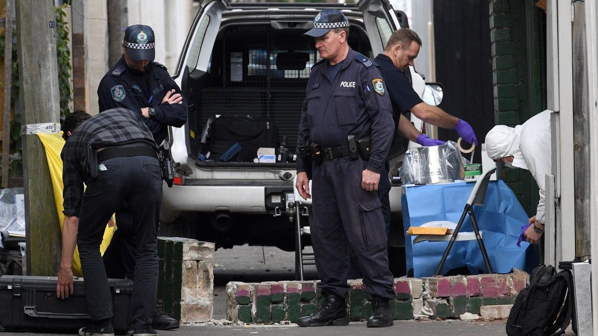 Police collect evidence outside