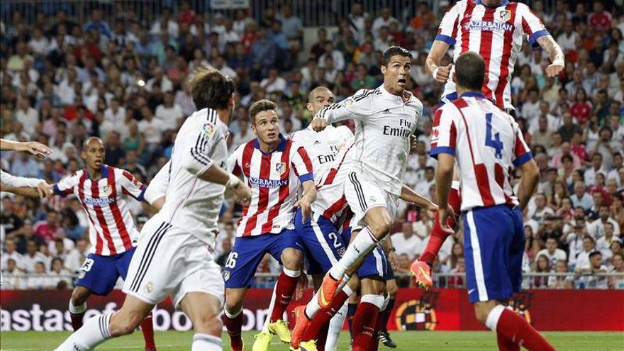 Real Madrid y Atlético empatan con goles de James y Raúl García