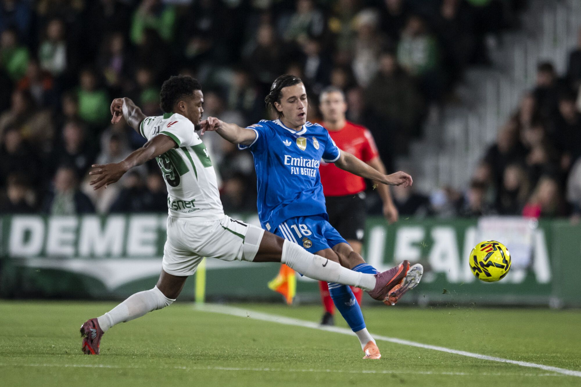 Alvaro Carreras of Real Madrid CF in action during the Spanish league, La Liga EA Sports, football match played between Elche CF and Real Madrid C.F. at Manuel Martinez Valero Stadium on November 23, 2025 in Elche, Spain. AFP7 23/11/2025 ONLY FOR USE IN SPAIN. Francisco Macia / AFP7 / Europa Press;2025;SPORT;ZSPORT;SOCCER;ZSOCCER;Elche CF v Real Madrid C.F - La Liga EA Sports;