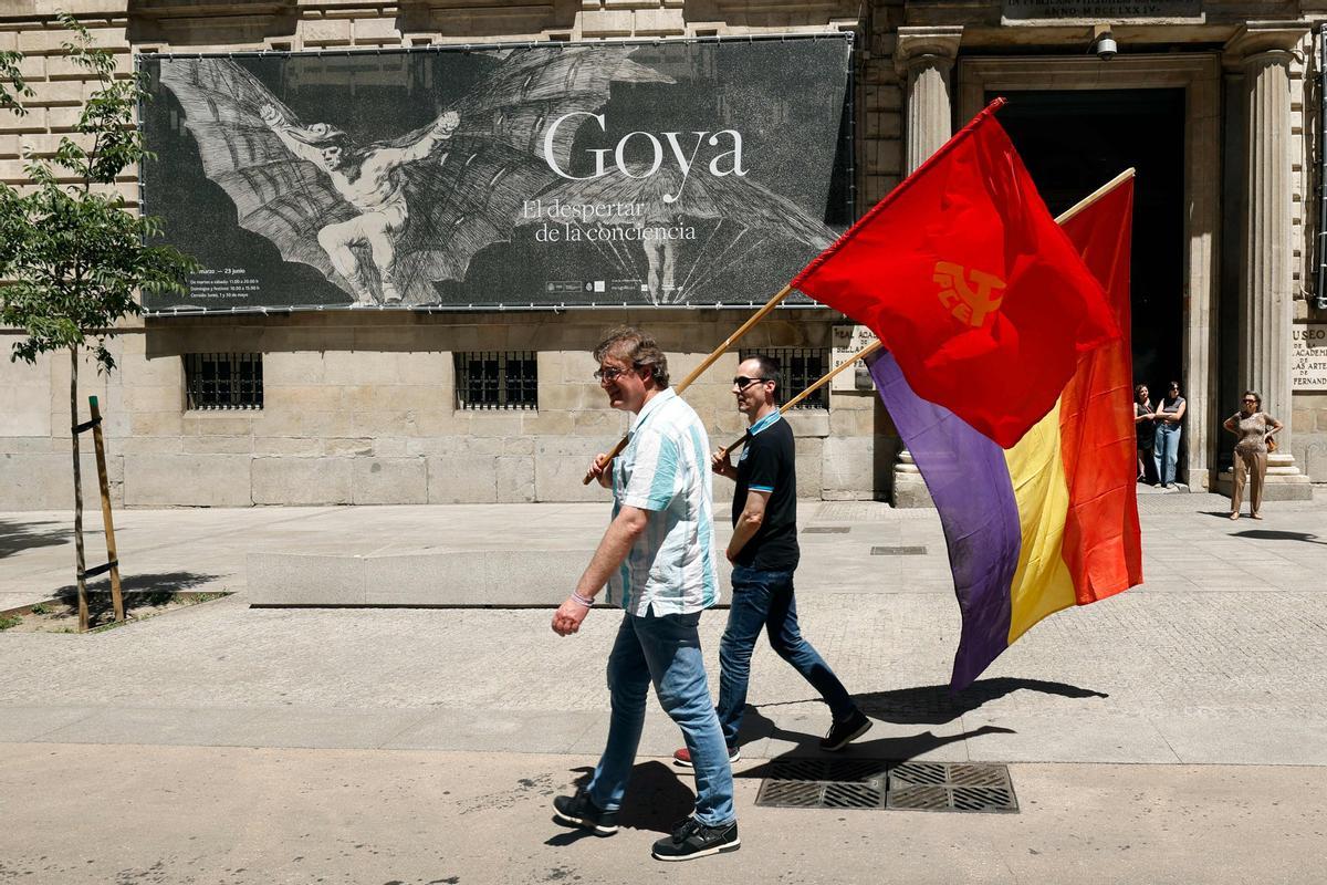 People hold flags during a pro-republic march under the slogan Felipe VI the Last One in Madrid on June 16, 2024, ahead of the 10th anniversary of the coronation of King Felipe VI of Spain. (Photo by OSCAR DEL POZO / AFP)