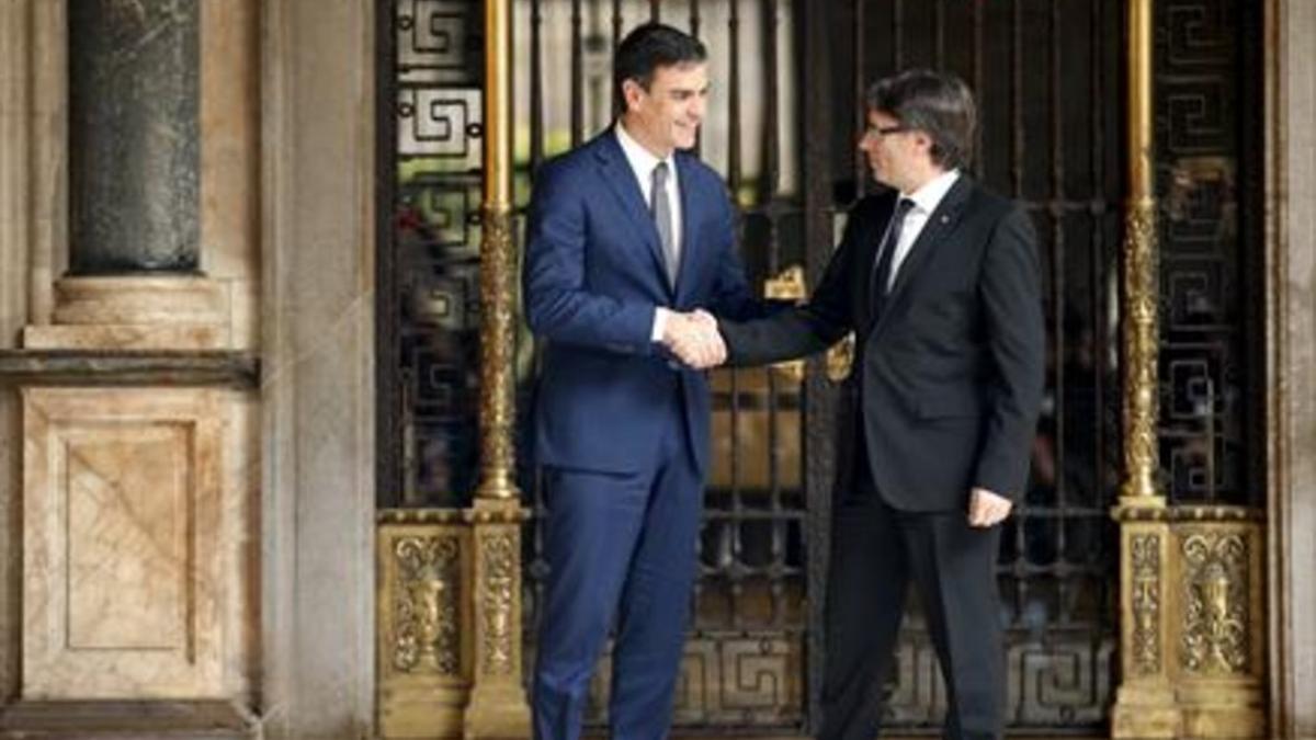 Pedro Sánchez y Carles Puigdemont.