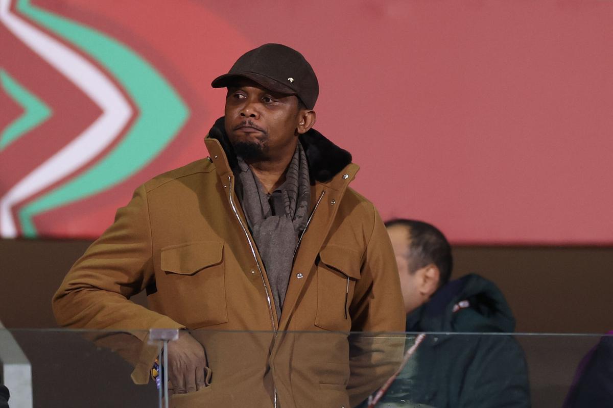 Former Cameroon footballer Samuel Eto'o watches during the Africa Cup of Nations (CAN) round of 16 football match between Ivory Coast and Burkina Faso at the Grand Stadium in Marrakesh on January 6, 2026. (Photo by FRANCK FIFE / AFP)