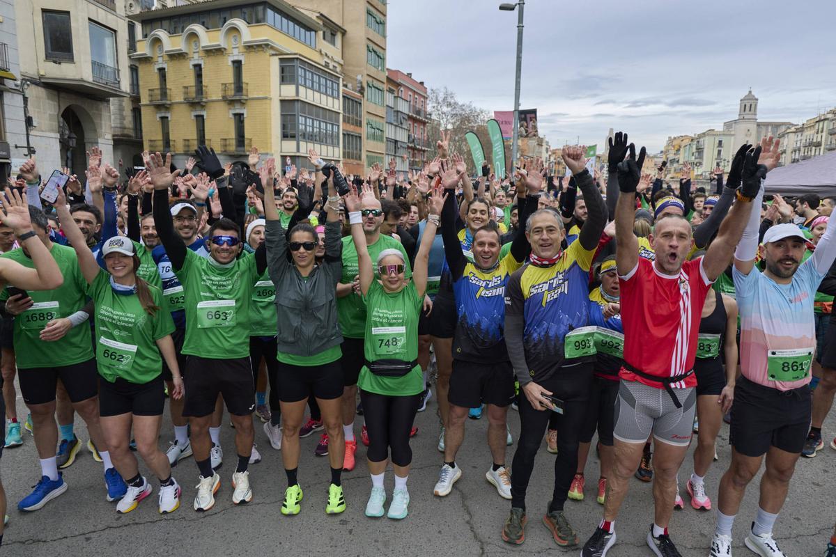 La XII Tradeinn Cursa Girona en Marxa Contra el Càncer en imatges