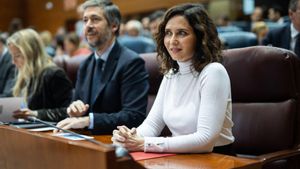 13/03/2025 La presidenta de la Comunidad de Madrid, Isabel Díaz Ayuso, y el consejero de Presidencia, Miguel Ángel García Martín, durante un pleno en la Asamblea de Madrid, a 13 de marzo de 2025, en Madrid (España). El quinto aniversario de la declaración del estado de alarma por la pandemia del Covid-19 agita el Pleno de la Asamblea de Madrid después de que la Comunidad negara que fallecieran en residencias en la primera ola de la pandemia 7.291 mayores. Además, la Cámara de Vallecas aprobará la comisión del PP sobre la quita de deuda y debatirá sobre agua, nucleares y violencia de género. POLITICA Alejandro Martínez Vélez - Europa Press