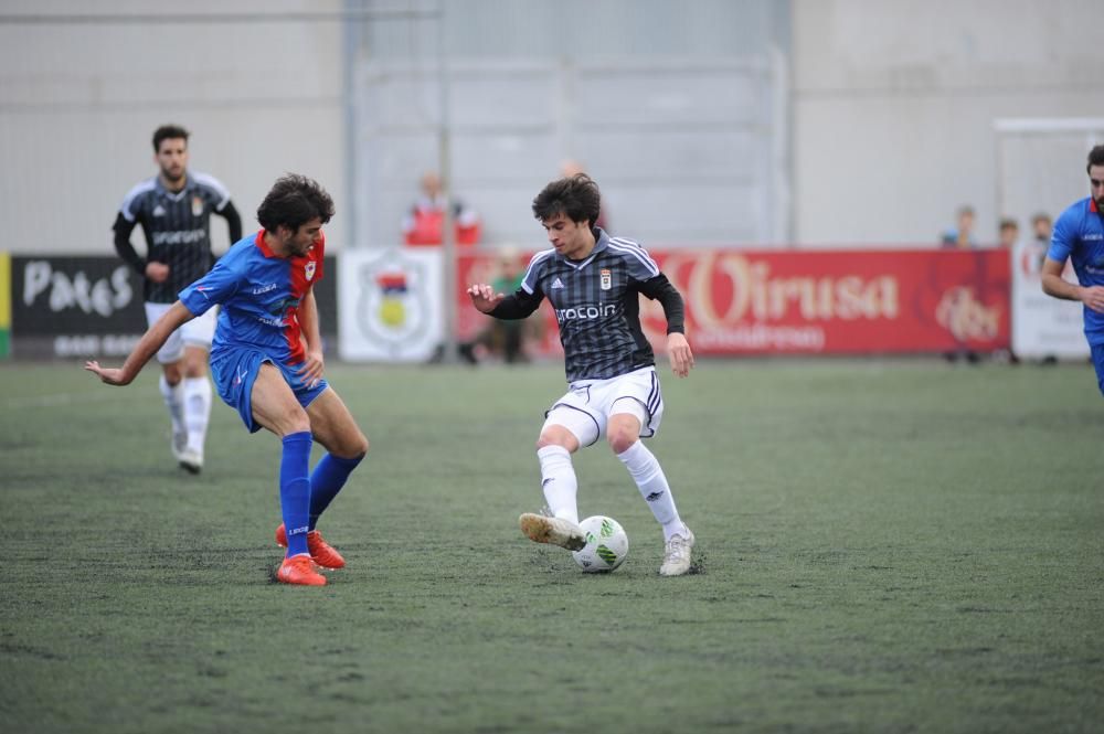 El partido entre el Langreo y el Oviedo B, en imágenes