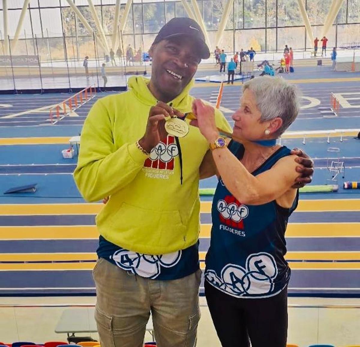 Maria Asunción Alberch amb el seu entrenador, Augusto Godínez.