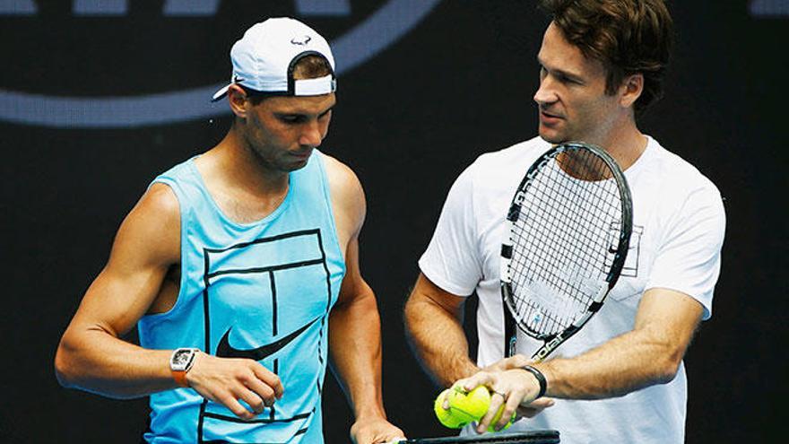 Carlos Moyà entrena junto a Rafa Nadal en el pasado Open de Australia