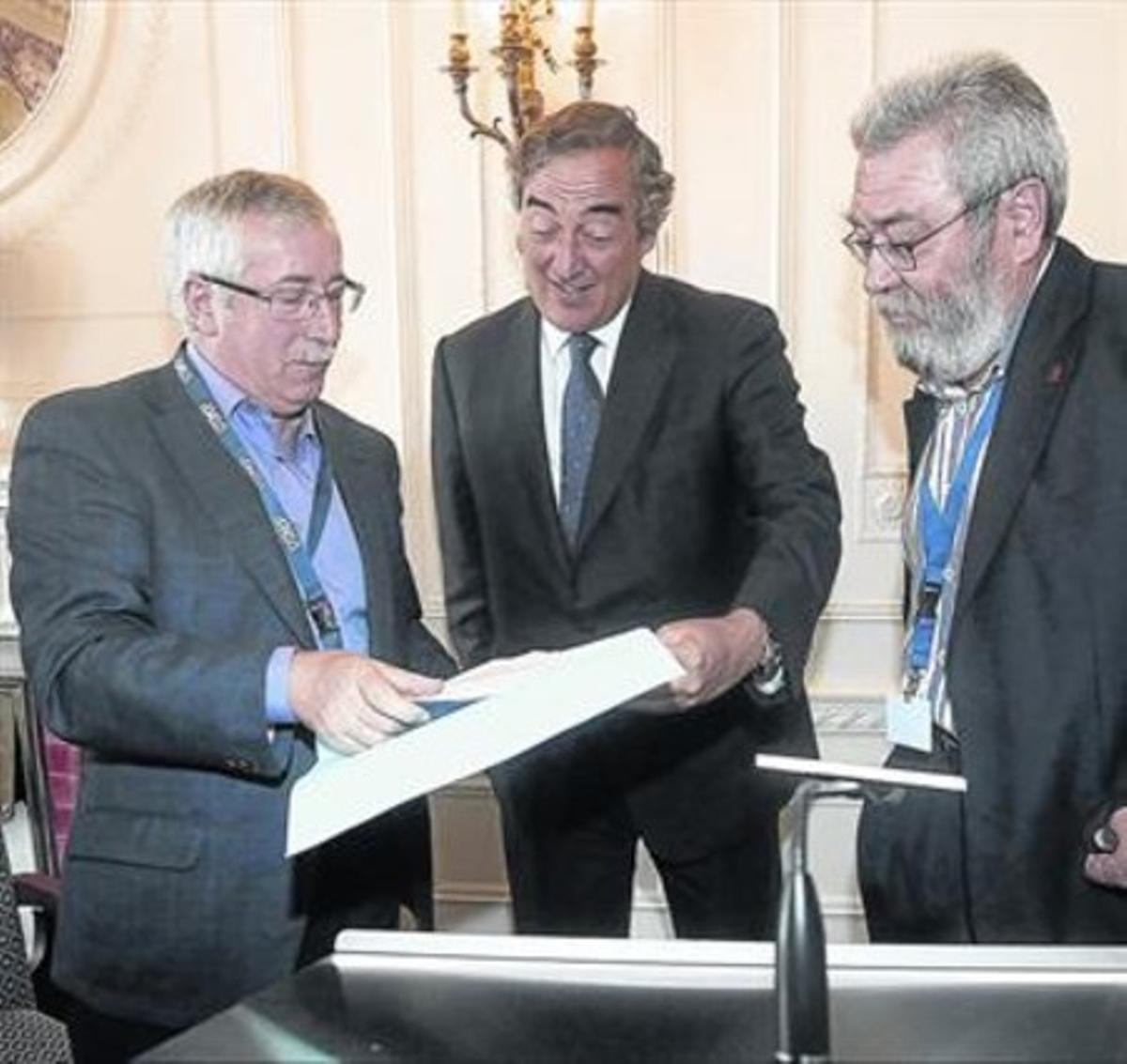 Fernández Toxo, Rosell y Méndez, durante un encuentro en un seminario.