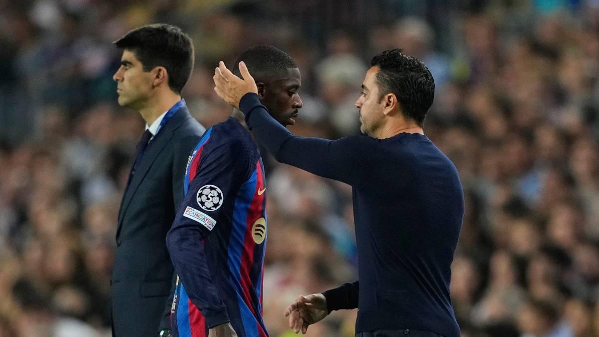Dembélé y Xavi, en una imagen de esta temporada