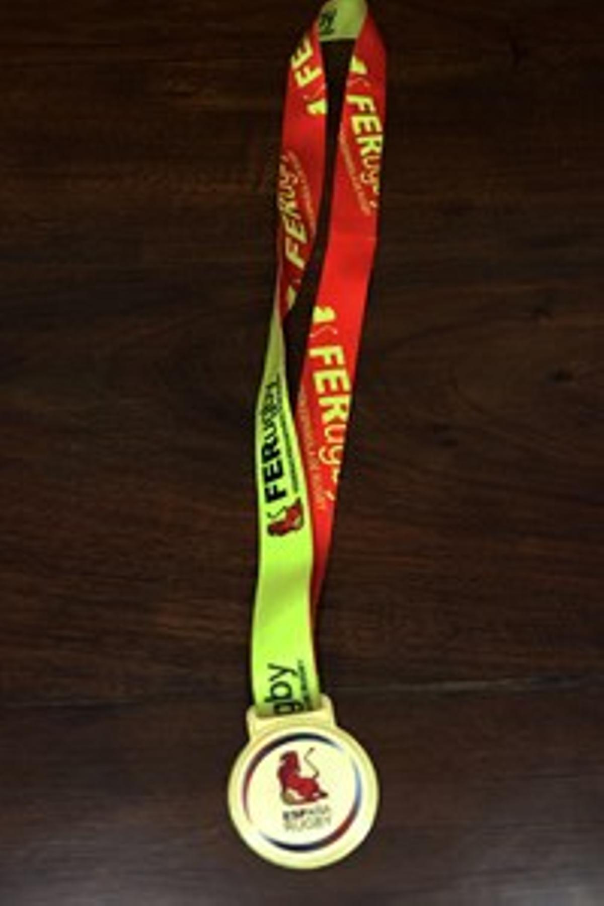 Medalla de oro.