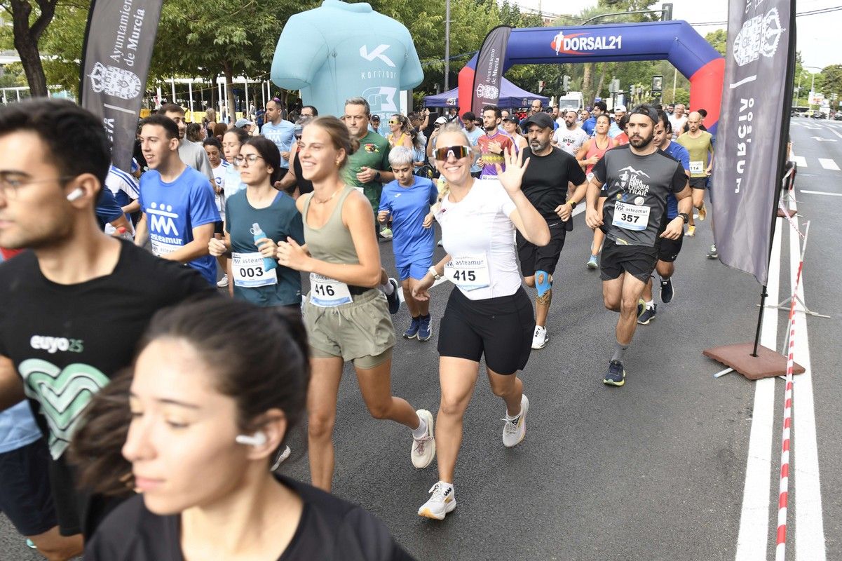 La carrera y marcha Solidaria Asteamur, en imágenes