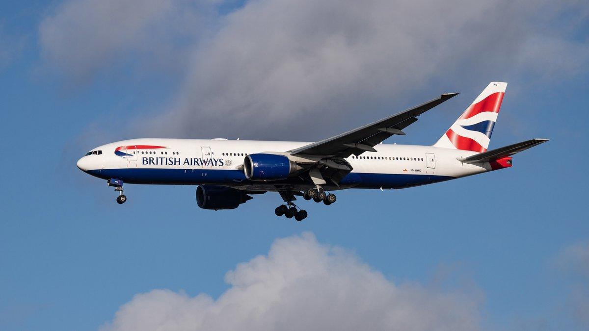 British Airways Boeing 777-200 airplane with registration G-YMMO landing at London Heathrow International Airport in England, UK that is the main hub and base for BAW. BA is the flag carrier airline and is member of Oneworld aviation alliance. Boeing 777-200(ER) is an airplane with extended range of distance flying capability. (Photo by Nicolas Economou/NurPhoto via Getty Images)