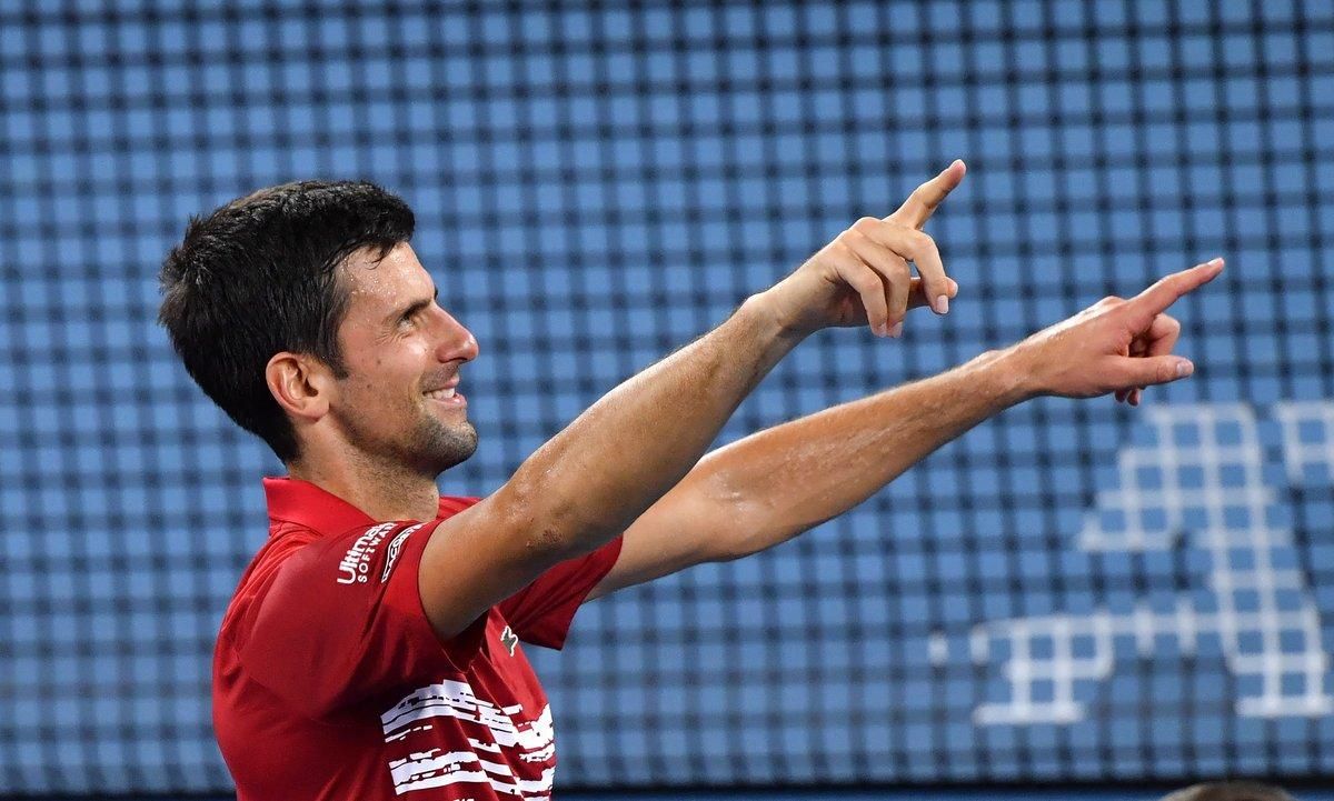 Brisbane (Australia), 06/01/2020.- Novak Djokovic of Serbia celebrates after winning the doubles match with partner Viktor Troicki against Edouard Roger-Vasselin and Nicolas Mahut of France during day 4 of the ATP Cup tennis tournament at Pat Rafter Arena in Brisbane, Australia, 06 January 2020. (Tenis, Francia) EFE/EPA/DARREN ENGLAND AUSTRALIA AND NEW ZEALAND OUT EDITORIAL USE ONLY