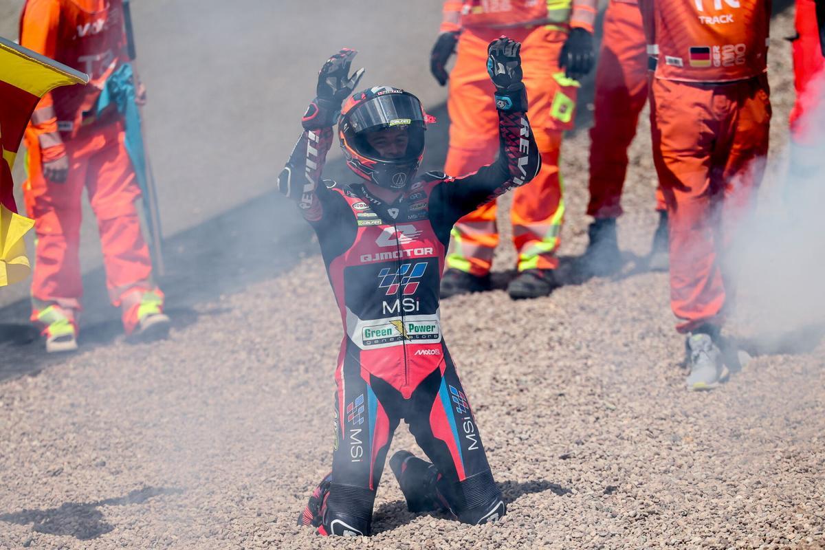 Hohenstein-Ernstthal (Germany), 12/07/2026.- Spanish Moto2 rider Ivan Ortola of QJMOTOR-Exocom-MSI celebrates after winning the Moto2 race of the motorcycling Grand Prix of Germany, at the Sachsenring racing circuit in Hohenstein-Ernstthal, Germany, 12 July 2026. (Motociclismo, Alemania) EFE/EPA/FILIP SINGER