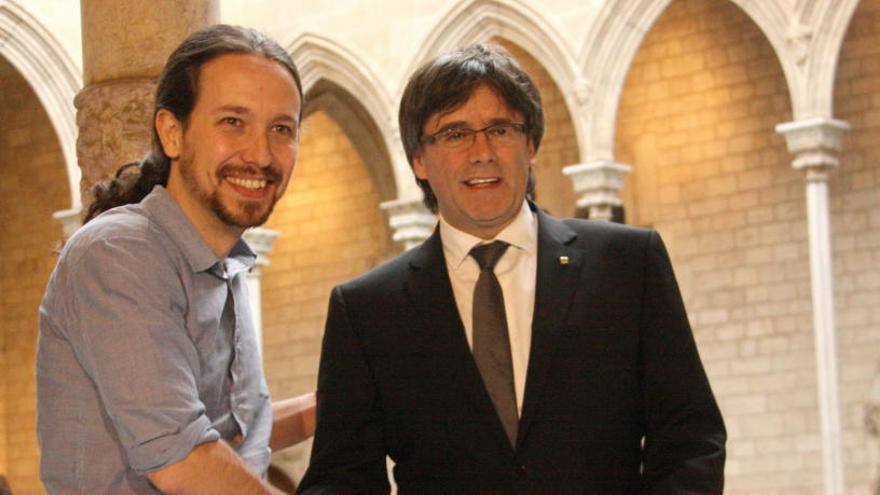 Puigdemont i Iglesias, en una reunió el 2016