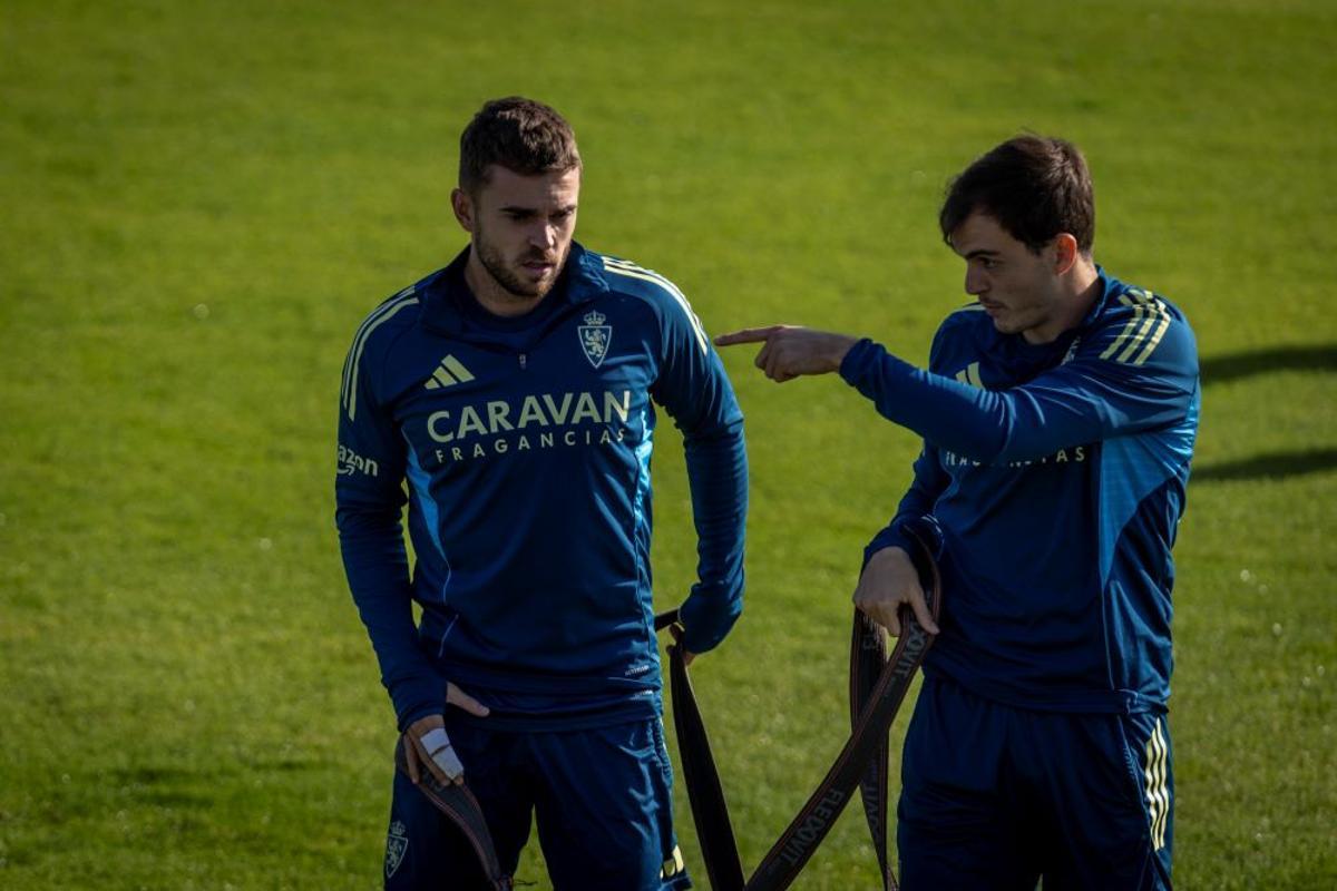 Soberón, junto a Francho en una sesión.