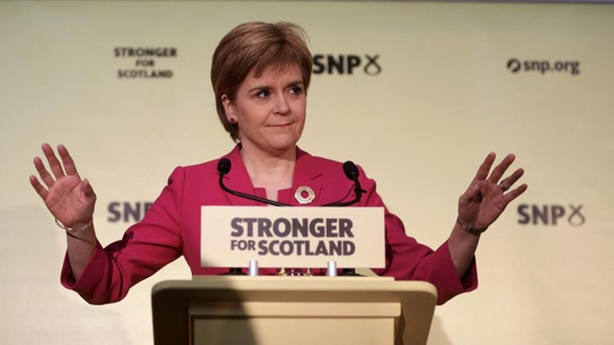 Scotland's First Minister and Scottish National Party (SNP) leader Nicola Sturgeon gestures as she delivers a speech in Edinburgh