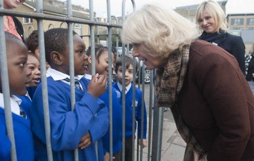 Britain's Camilla, Duchess of Cornwall speaks to schoolchildren during a visit to St Mary's R. C. Primary School in London