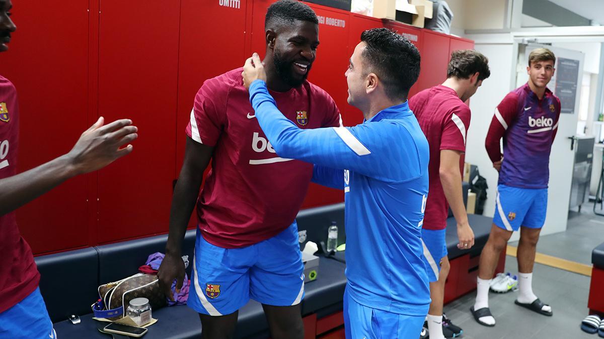 Umtiti y Xavi, en una imagen de archivo