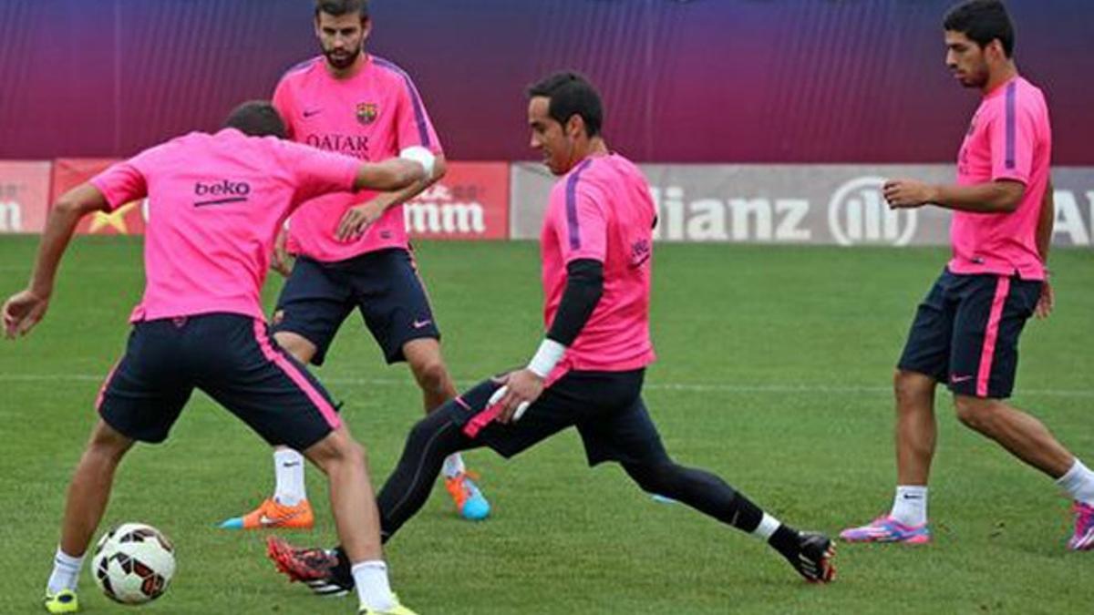 Los jugadores del Barça durante el entrenamiento de este miércoles