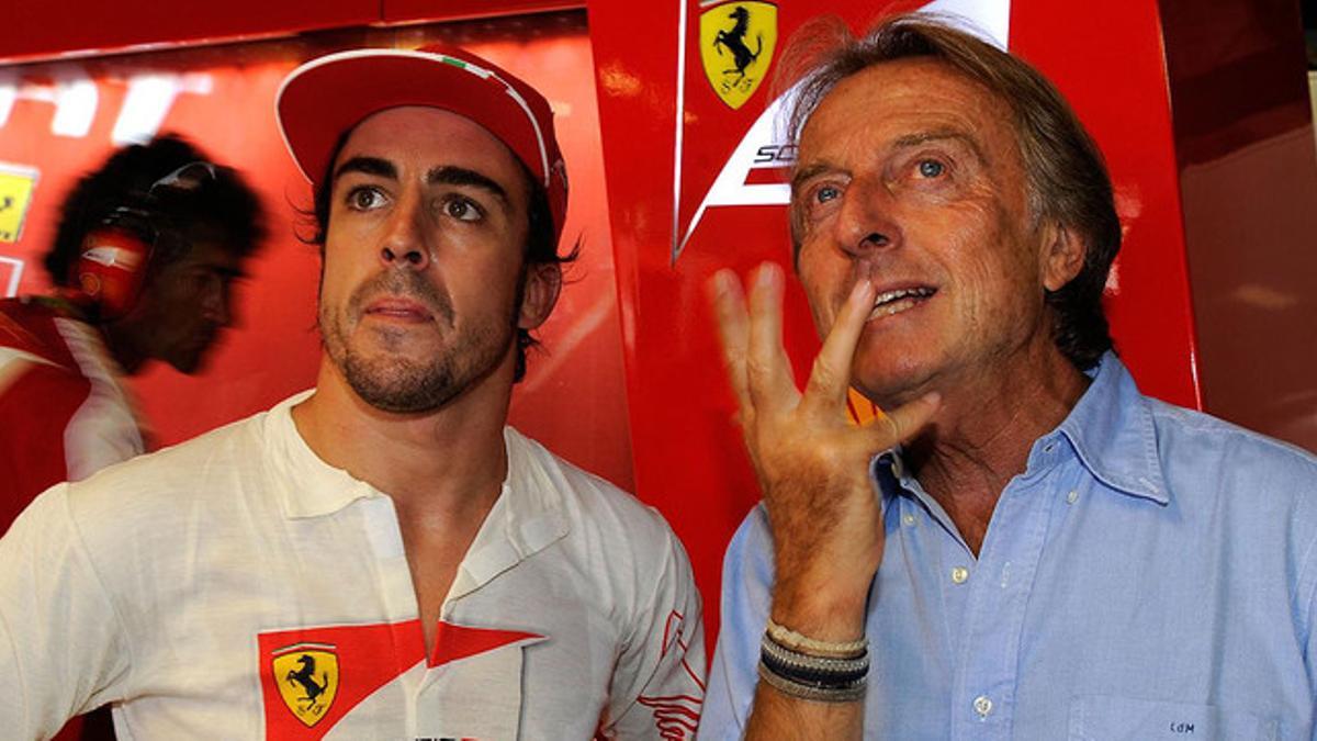 Fernando Alonso y Luca Cordero di Montezemolo, en un acto de Ferrari en el 2013