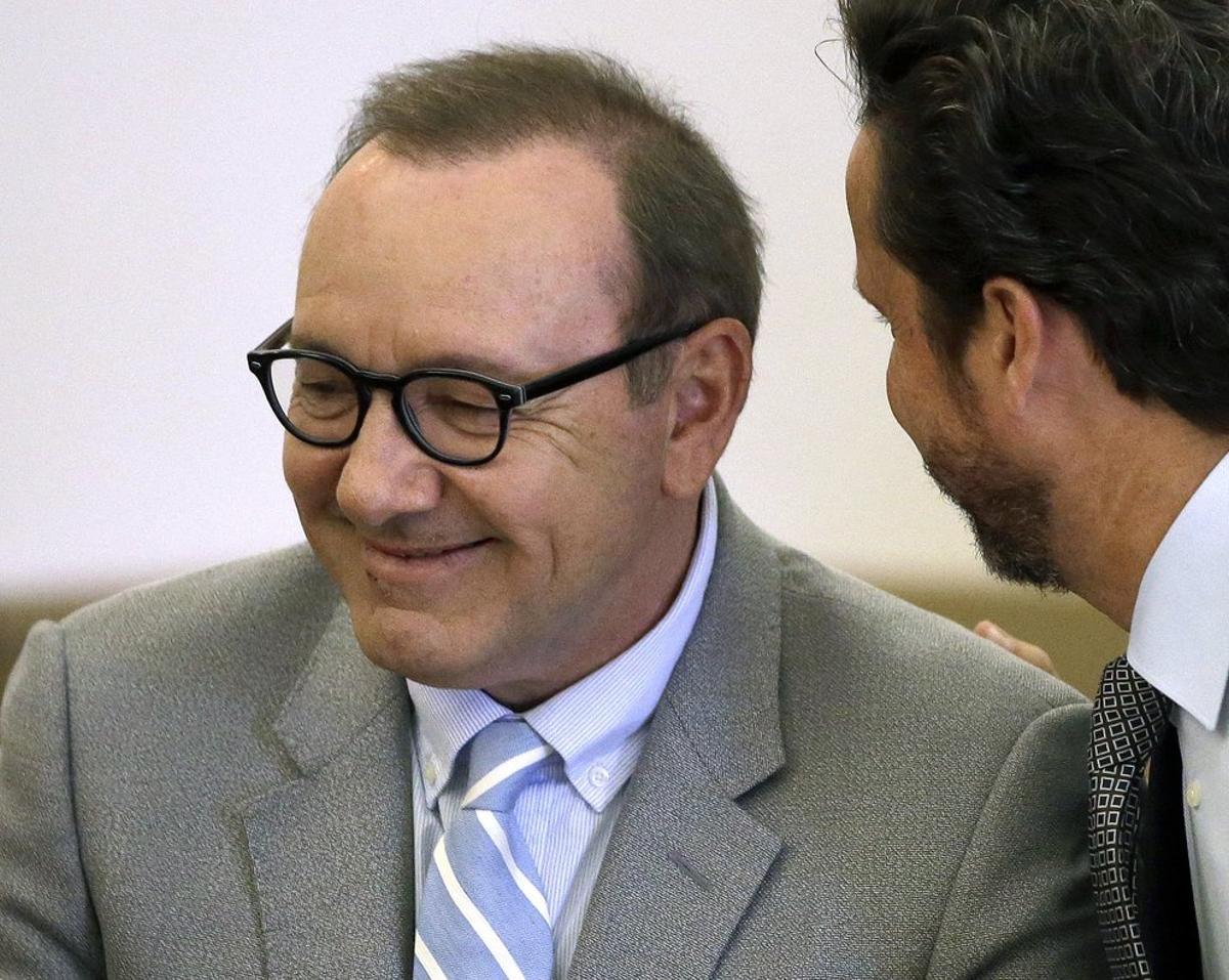 Actor Kevin Spacey listens to attorney Alan Jackson during a pretrial hearing on Monday, June 3, 2019, at district court in Nantucket, Mass. The Oscar-winning actor is accused of groping the teenage son of a former Boston TV anchor in 2016 in the crowded bar at the Club Car in Nantucket. (AP Photo/Steven Senne)