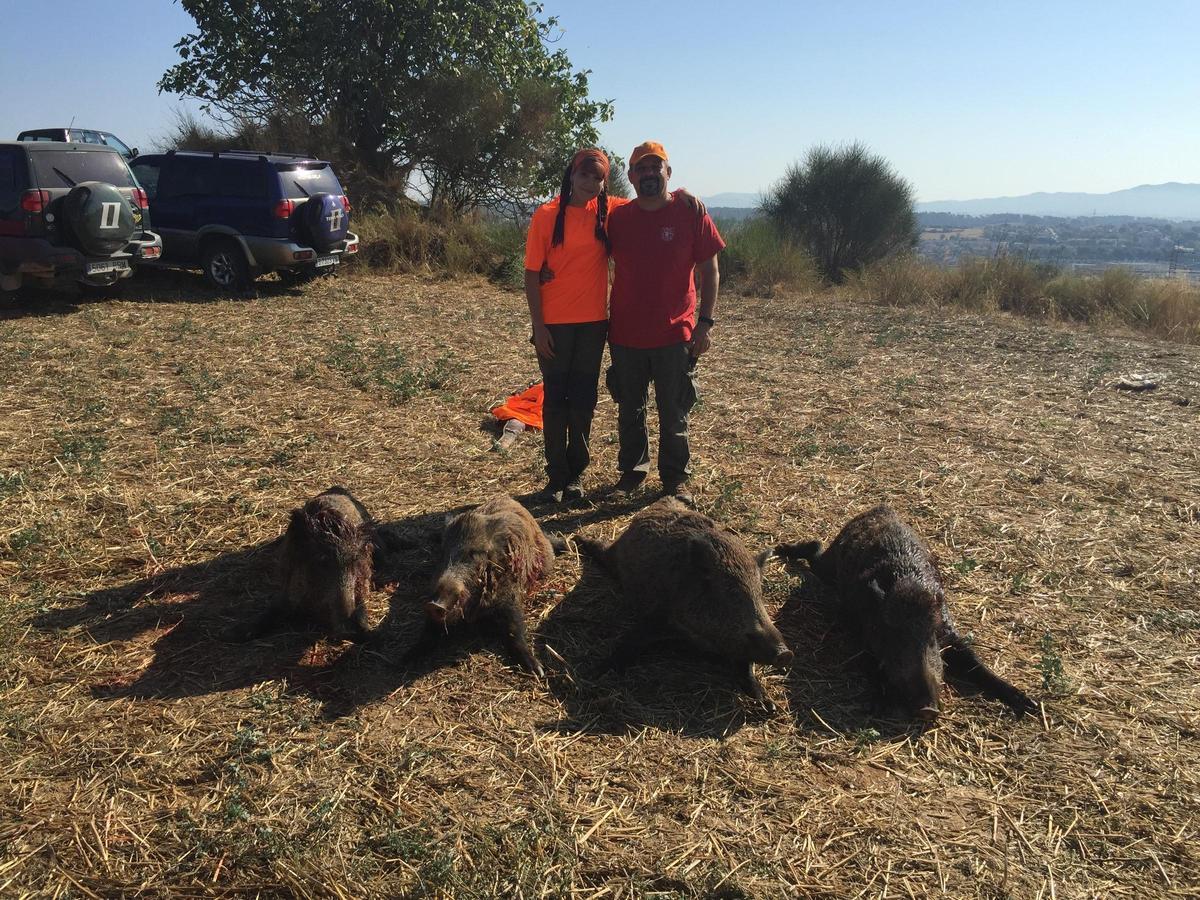 Cazadores con presas conseguidas