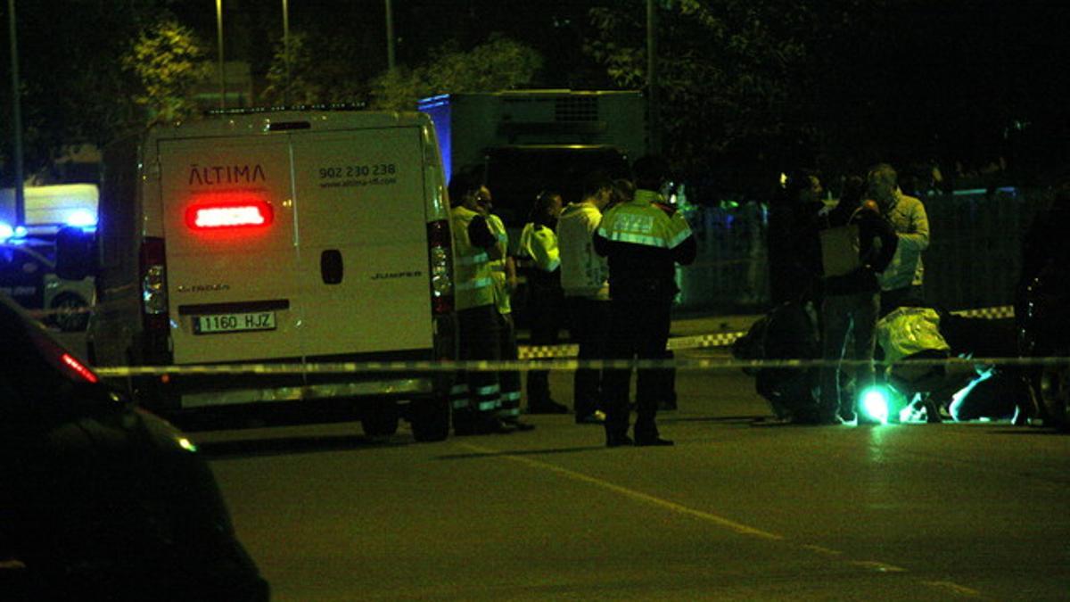 La policia científica trabajando en el lugar de los hechos