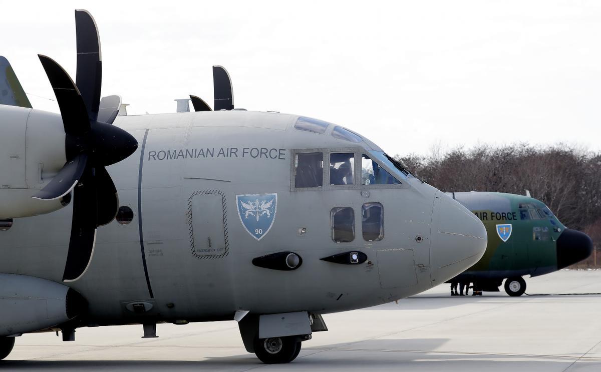 Otopeni (Romania), 06/02/2023.- Romanian military transport airplanes wait for their load before being deployed to Southern Turkey to help local authorities in their rescue missions after the devastating earthquake that hit Turkey and Syria, at the military airbase no. 90, in Otopeni, near Bucharest, Romania, 06 February 2023. Two Romanian military aircraft will take 58 rescuers and 4 specialized dogs to Turkey, as well as the materials necessary for their mission, which will support the efforts of the Turkish authorities to search for survivors in the areas affected by the latest earthquakes. According to the US Geological Service, an earthquake with a preliminary magnitude of 7.8 struck southern Turkey close to the Syrian border. The earthquake caused buildings to collapse and sent shockwaves over northwest Syria, Cyprus, and Lebanon. (Terremoto/sismo, Abierto, Chipre, Líbano, Rumanía, Siria, Turquía, Bucarest) EFE/EPA/ROBERT GHEMENT