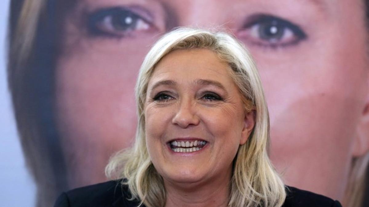 Marine Le Pen, French National Front political party leader and candidate for the regional elections in the Nord-Pas-de-Calais-Picardie region, attends a news conference in Lille