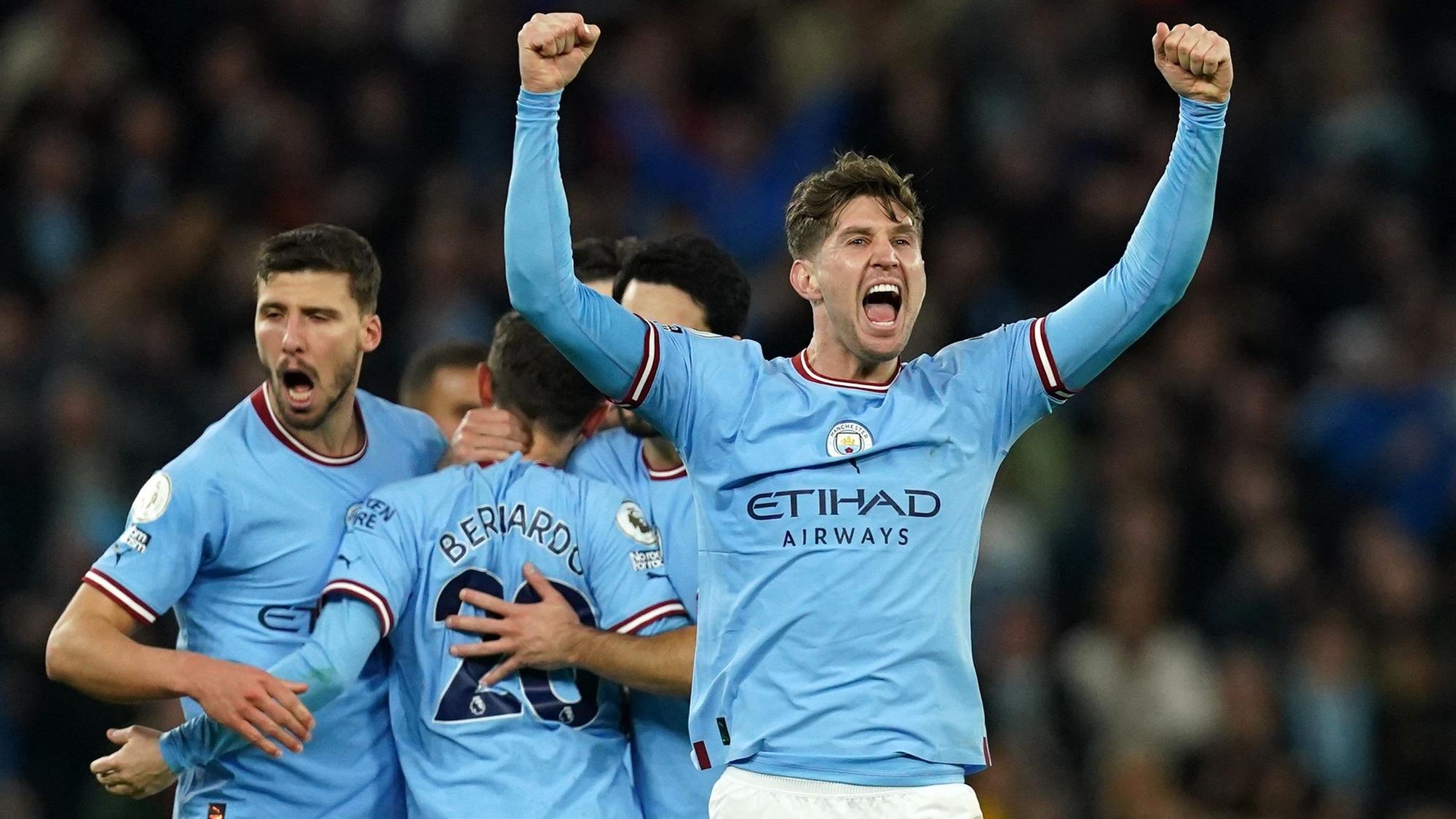 26 April 2023, United Kingdom, Manchester: Manchester City's John Stones celebrates scoring his side's second goal during the English Premier League match between Manchester City and Arsenal at the Etihad Stadium. Photo: Martin Rickett/PA Wire/dpa