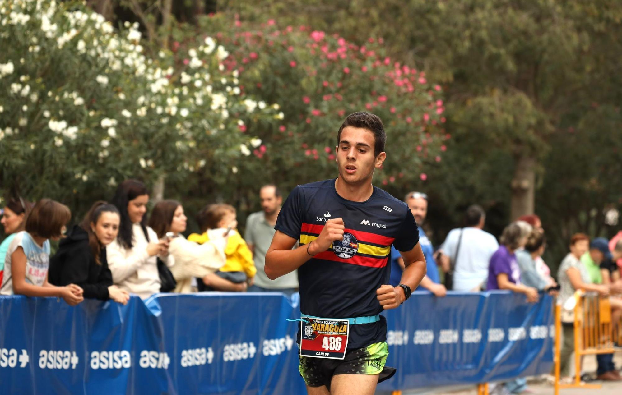 En imágenes | Carrera 5K contra el maltrato de Zaragoza