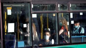 zentauroepp53835534 passengers are seen through a window as they wear masks whil200621195407