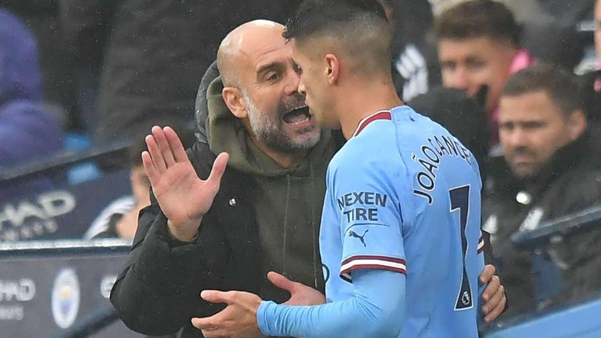 Guardiola y Cancelo