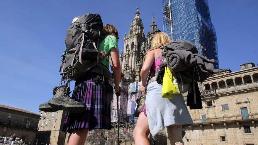 Peregrinos, a su llegada a la Catedral de Santigo. // Xoán Álvarez